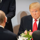 President Trump sits across from Russian President Vladimir Putin during lunch at the Elysee Palace on November 11, 2018 in Paris, France.